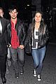 taylor lautner marie avgeropoulos matching jackets london 05